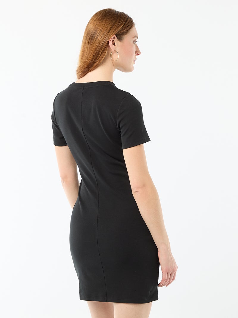 Abito t-shirt corto con fiocco fantasia Nero - Kiabi