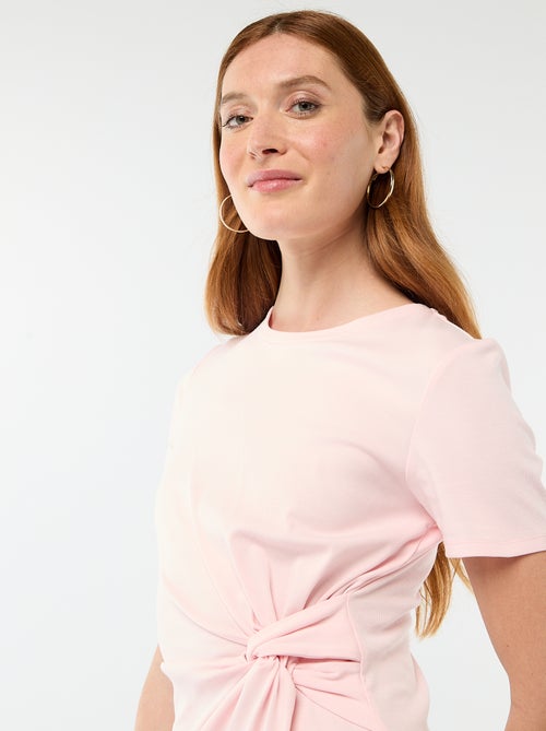 Abito t-shirt corto con fiocco fantasia - Kiabi Abito t-shirt corto con fiocco fantasia - Kiabi