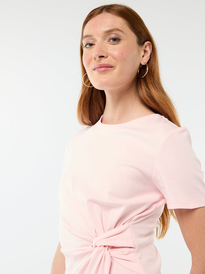 Abito t-shirt corto con fiocco fantasia Rosa - Kiabi