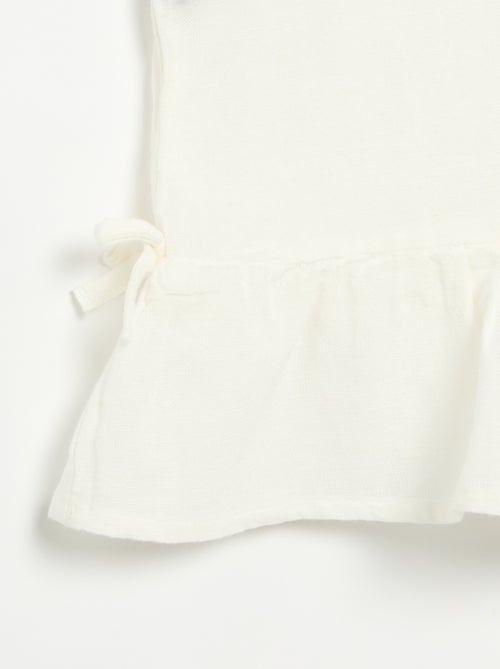 Blouse peplum  avec nœuds fantaisies - Kiabi