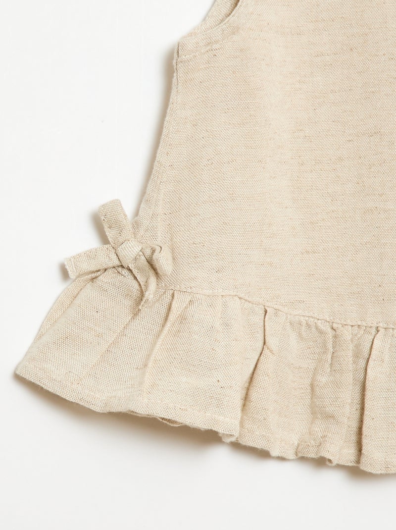Blouse sans manches avec volants et nœuds Beige - Kiabi