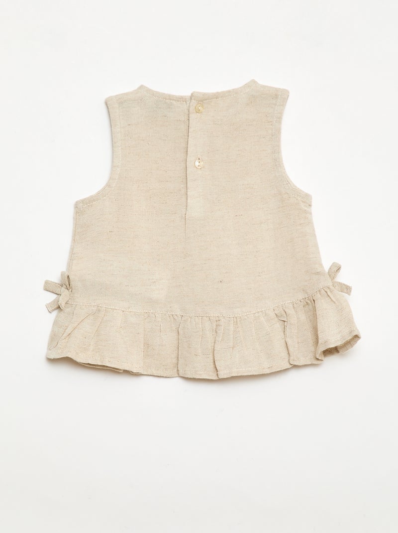 Blouse sans manches avec volants et nœuds Beige - Kiabi