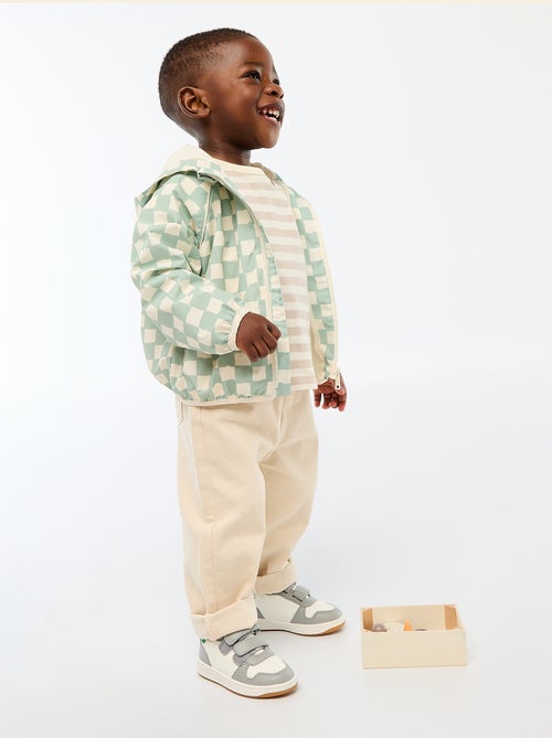 Blouson coupe vent à capuche all-over - Kiabi