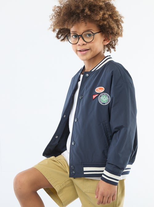 Blouson forme aviateur à pressions - Kiabi Blouson forme aviateur à pressions - Kiabi