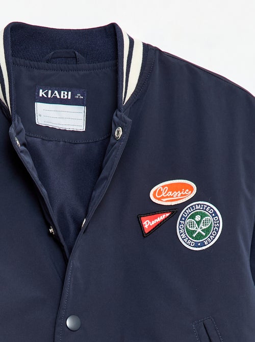 Blouson forme aviateur à pressions - Kiabi Blouson forme aviateur à pressions - Kiabi