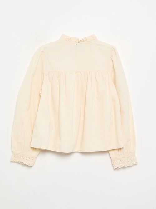 Bluse mit bestickten Ärmelbündchen und Rüschenkragen - Kiabi