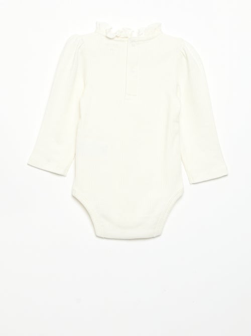 Body a costine con collo fantasia - Kiabi Body a costine con collo fantasia - Kiabi