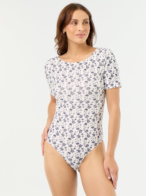 Body floreale con scollo sulla schiena - Kiabi Body floreale con scollo sulla schiena - Kiabi