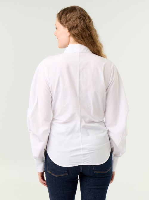Camicia dal taglio fantasia e aderente sul davanti - Kiabi Camicia dal taglio fantasia e aderente sul davanti - Kiabi