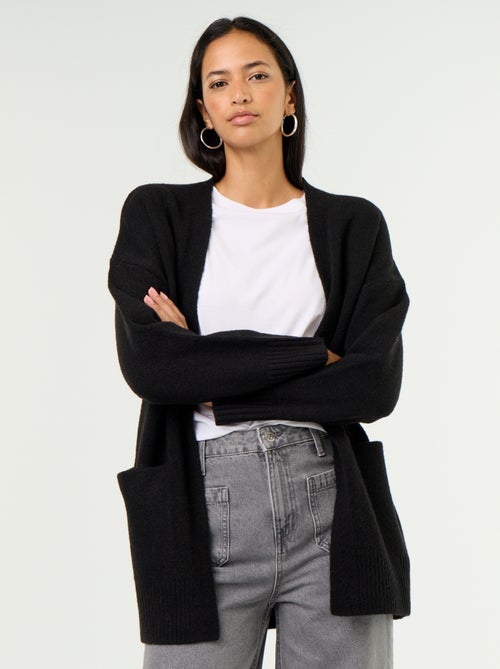 Cardigan aperto tinta unita con 2 tasche applicate - Kiabi Cardigan aperto tinta unita con 2 tasche applicate - Kiabi