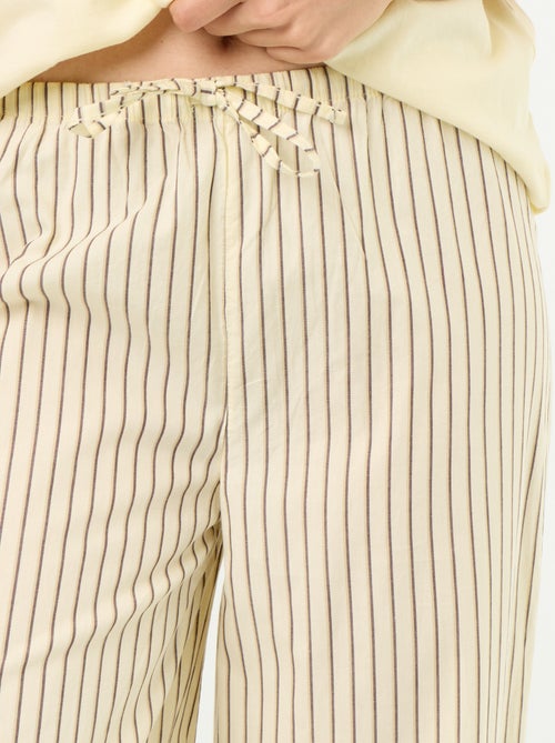 Completo pigiama in cotone - T-shirt + pantaloni - Kiabi Completo pigiama in cotone - T-shirt + pantaloni - Kiabi