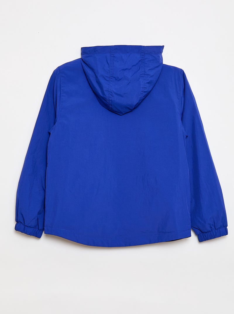 Coupe-vent uni qui se range dans sa capuche Bleu - Kiabi