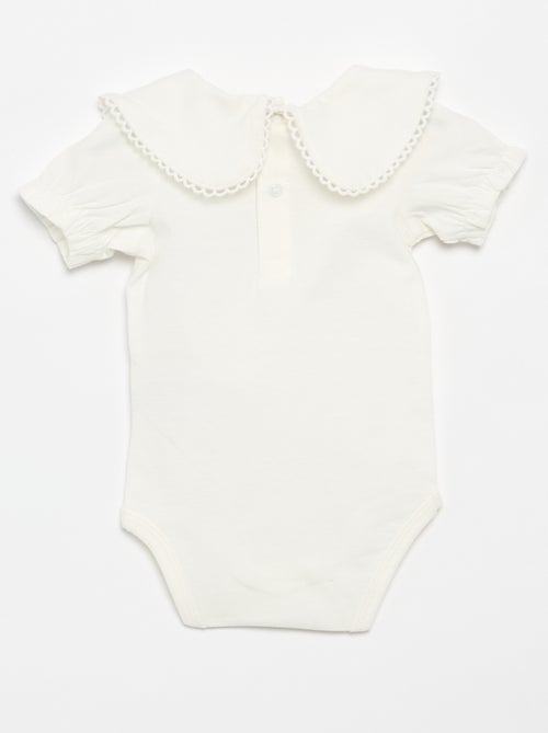 Decorative collar bodysuit - Kiabi Decorative collar bodysuit - Kiabi