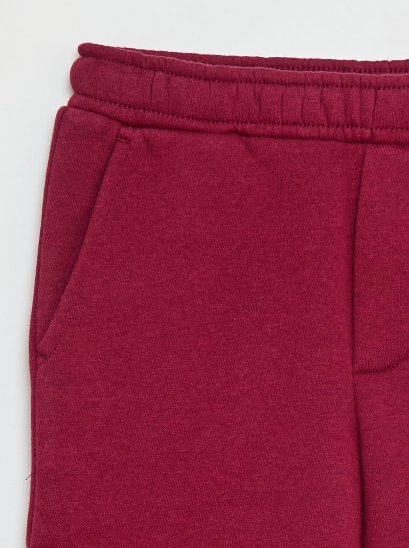 Einfarbige Jogginghose aus Sweatstoff mit vielen Taschen Rot - Kiabi