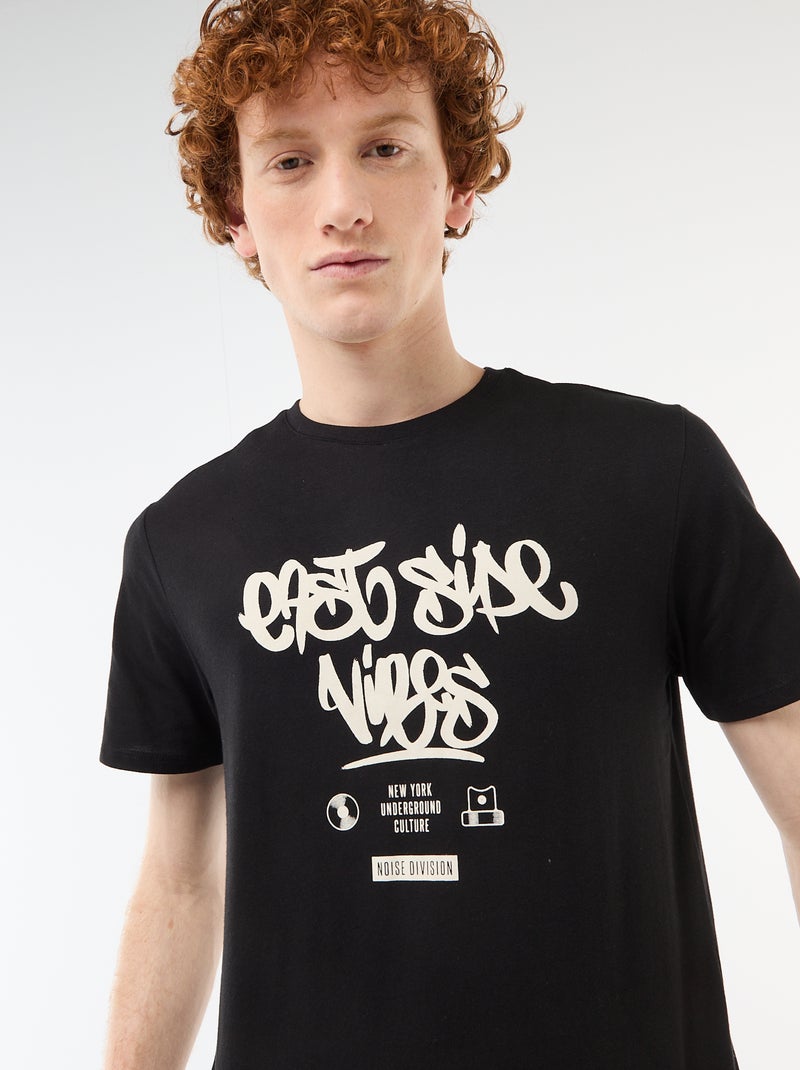 Einfarbiges Baumwoll-T-Shirt mit platziertem Print Schwarz - Kiabi