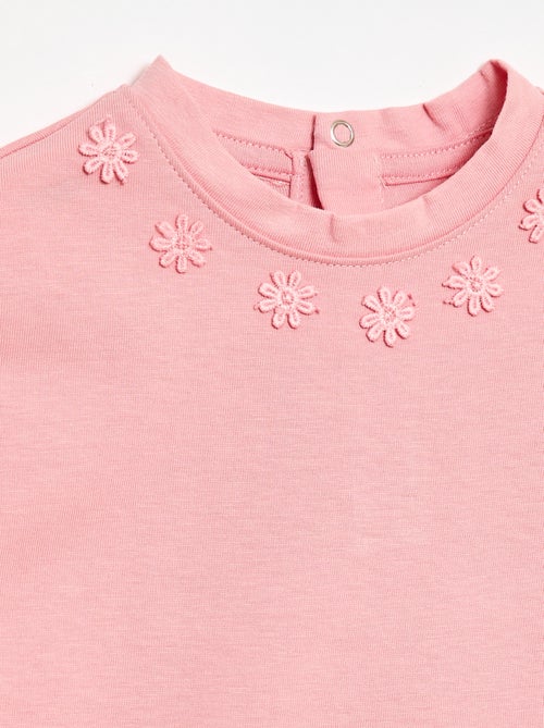 Einfarbiges T-Shirt mit Fantasieblumen am Kragen - Kiabi