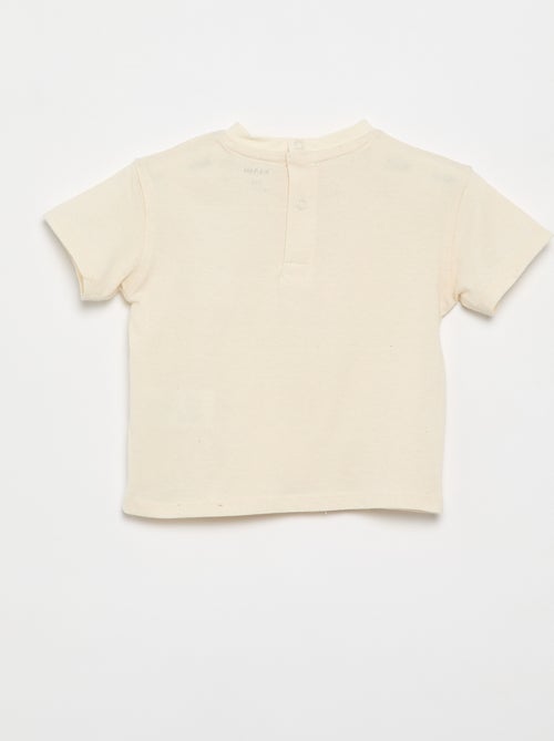 Einfarbiges T-Shirt mit fantasievollen Blumen am Kragen - Kiabi