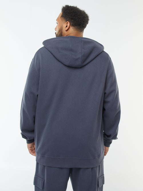 Felpa in maglia piqué con apertura con zip e cappuccio - Kiabi Felpa in maglia piqué con apertura con zip e cappuccio - Kiabi