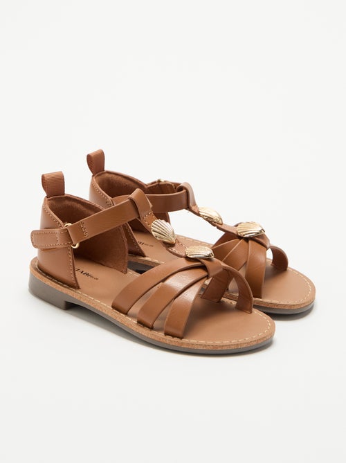Flache Sandalen mit ausgefallenen Muschel-Schmuckdetails - Kiabi Flache Sandalen mit ausgefallenen Muschel-Schmuckdetails - Kiabi