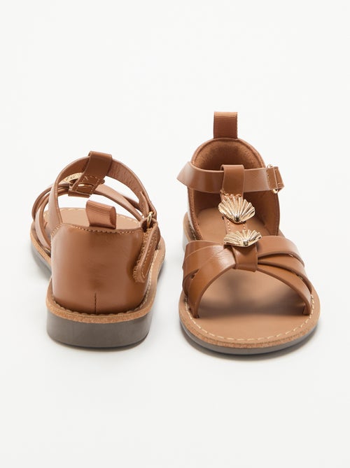 Flache Sandalen mit ausgefallenen Muschel-Schmuckdetails - Kiabi Flache Sandalen mit ausgefallenen Muschel-Schmuckdetails - Kiabi
