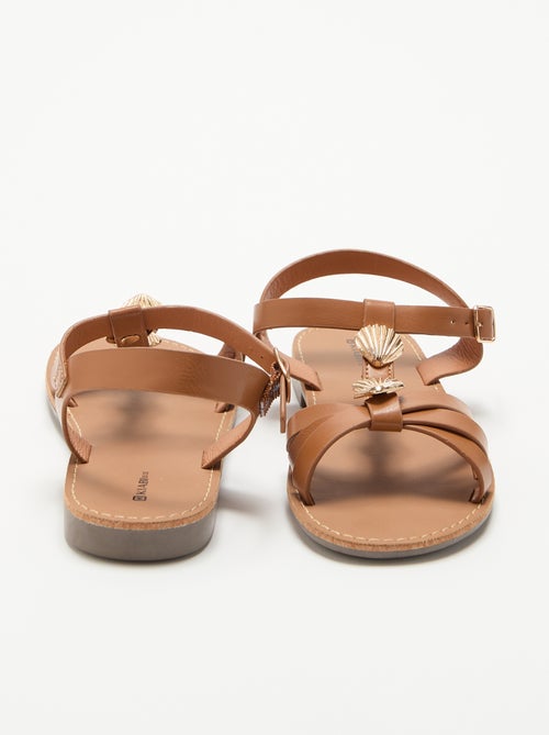 Flache Sandalen mit fantasievollen Muschel-Schmuckelementen - Kiabi Flache Sandalen mit fantasievollen Muschel-Schmuckelementen - Kiabi