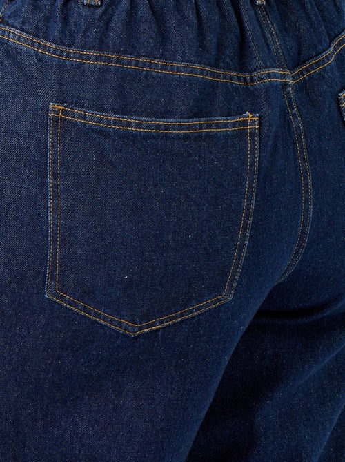 Jeans a gamba larga con risvolto alla base - Kiabi Jeans a gamba larga con risvolto alla base - Kiabi