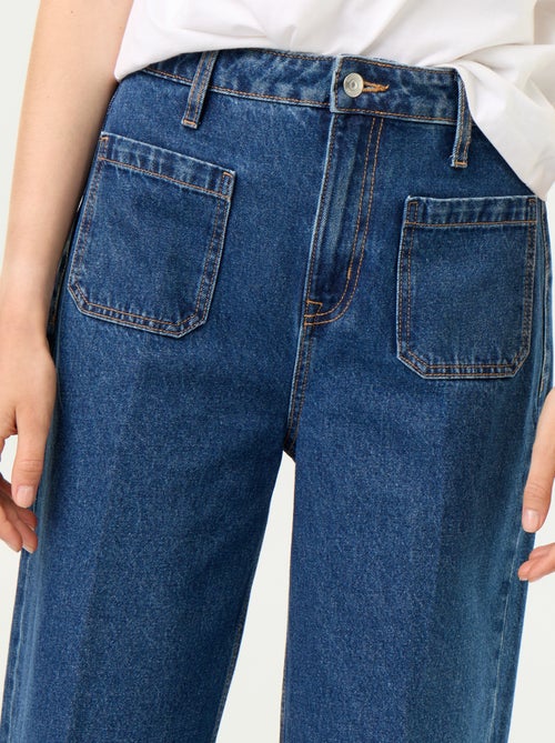 Jeans ampi a vita alta con tasche applicate - Kiabi Jeans ampi a vita alta con tasche applicate - Kiabi