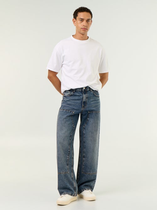 Jeans baggy a tinta unita con inserti fantasia - Kiabi Jeans baggy a tinta unita con inserti fantasia - Kiabi