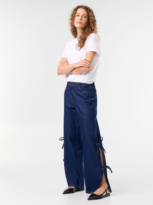 Jeans wide leg a gamba larga con nodi fantasia al fondo - Kiabi Jeans wide leg a gamba larga con nodi fantasia al fondo - Kiabi