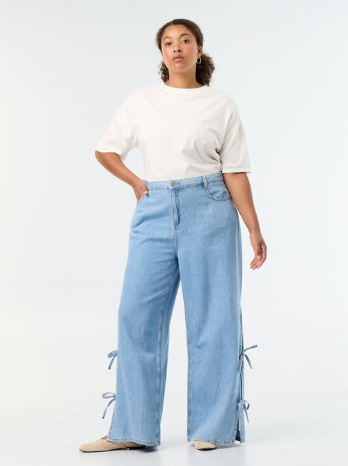 Jeans wide leg con nodi fantasia sui lati - Kiabi Jeans wide leg con nodi fantasia sui lati - Kiabi