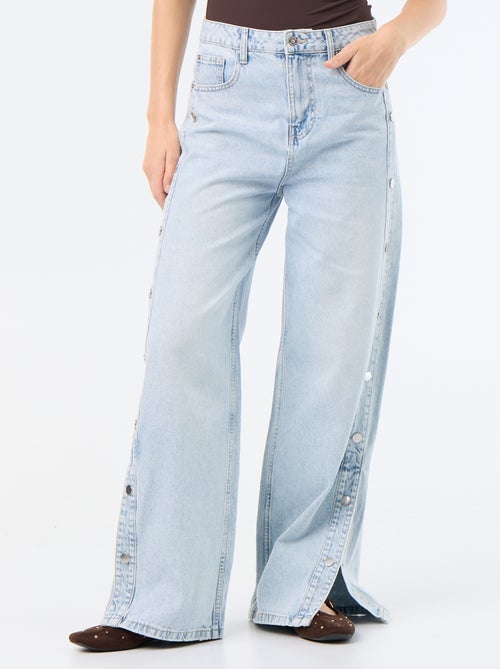 Jeans wide leg / taglio ampio con bottoni a pressione finti sui lati - Kiabi Jeans wide leg / taglio ampio con bottoni a pressione finti sui lati - Kiabi
