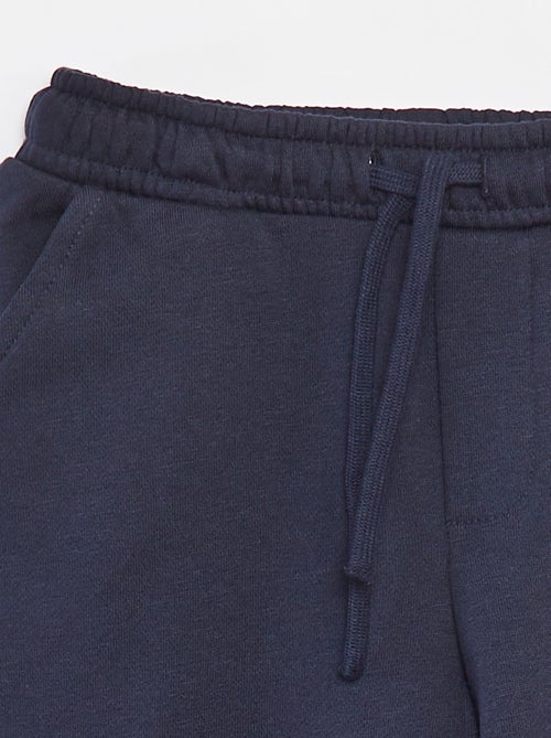 Joggers in tessuto felpato con tasche - Kiabi
