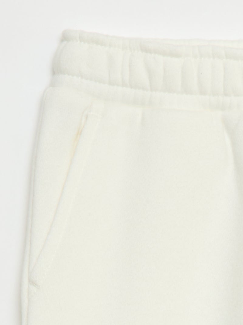 Joggers in tessuto felpato multitasche Bianco - Kiabi