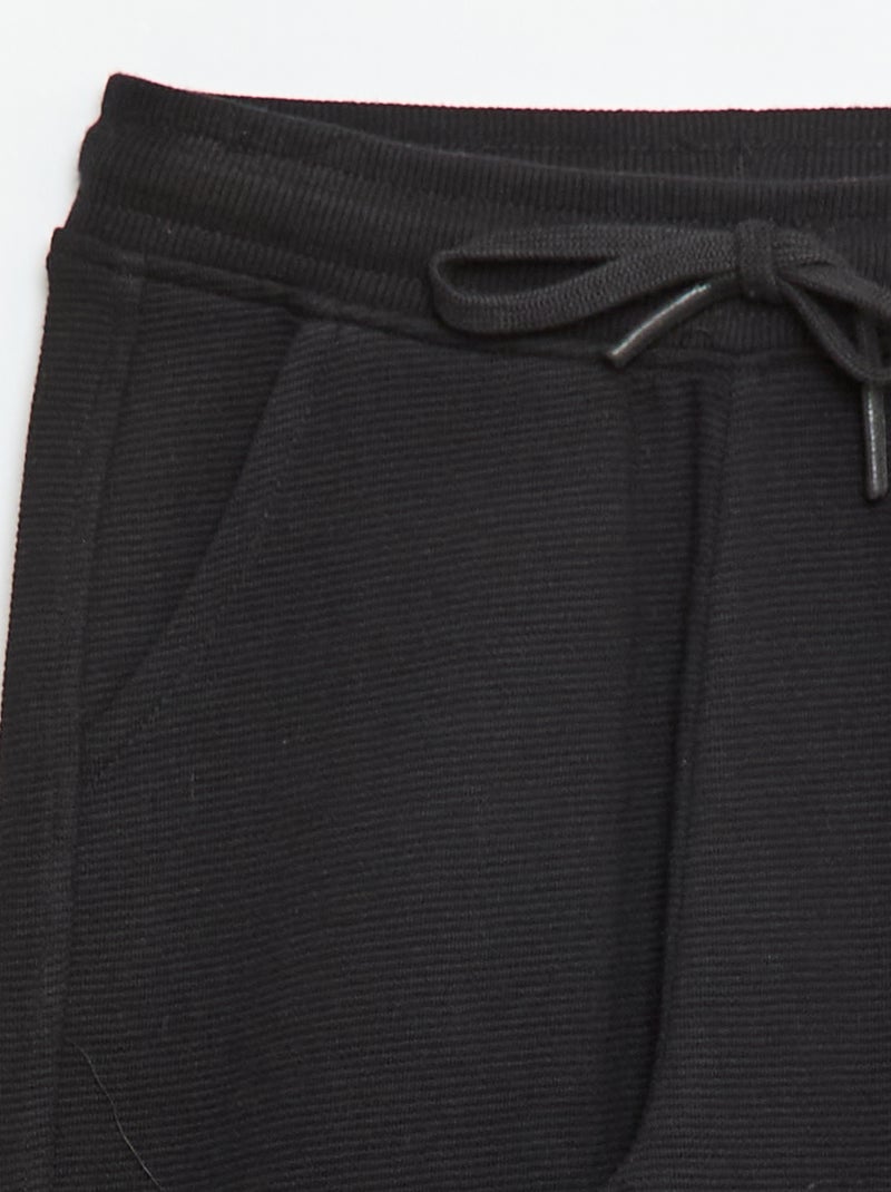 Joggers tinta unita in felpa leggera Nero - Kiabi