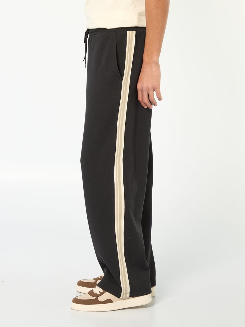 Jogging wide leg avec bande fantaisie Noir - Kiabi