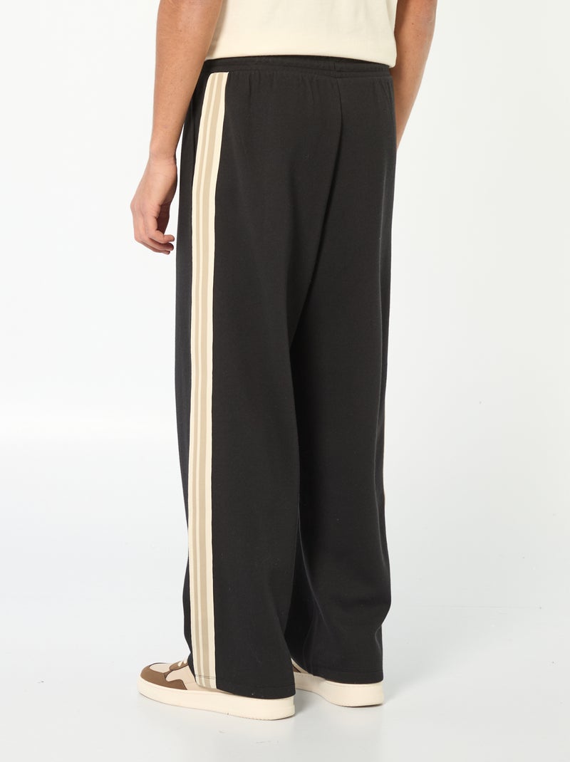 Jogging wide leg avec bande fantaisie Noir - Kiabi