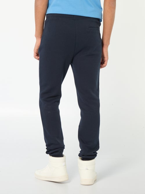 Jogginghose aus angerautem Fleece mit 2 Reissverschlusstaschen - Kiabi