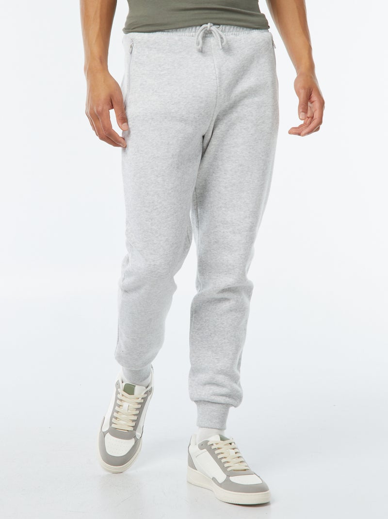 Jogginghose aus angerautem Fleece mit 2 Reissverschlusstaschen Hellgrau - Kiabi