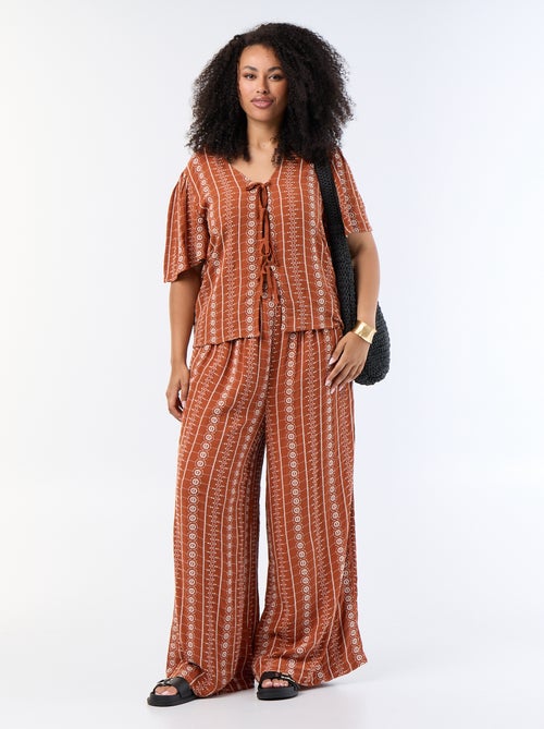 Kurzarm-Bluse mit Schleifen und Stickereien - Kiabi Kurzarm-Bluse mit Schleifen und Stickereien - Kiabi