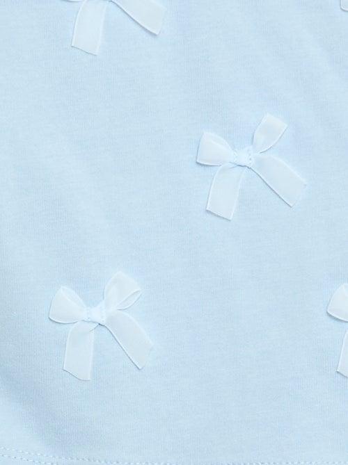 Kurzarm-Jersey-T-Shirt mit verspielten Schleifen - Kiabi Kurzarm-Jersey-T-Shirt mit verspielten Schleifen - Kiabi