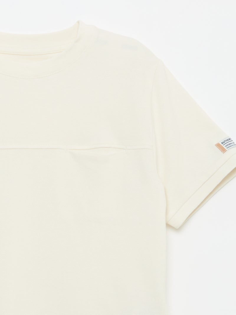 Kurzärmliges T-Shirt aus Piqué-Baumwolle Ecru - Kiabi