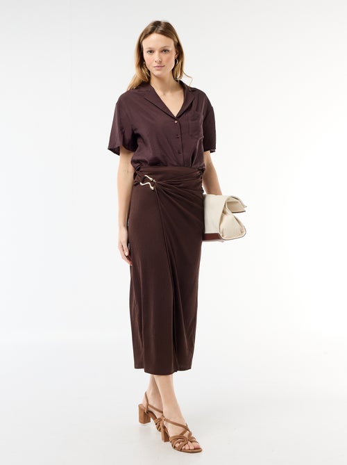 Long skirt with gold buckle at the waist - Kiabi