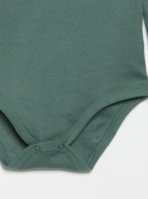 Long-sleeved bodysuit with buttoned collar - Kiabi Long-sleeved bodysuit with buttoned collar - Kiabi
