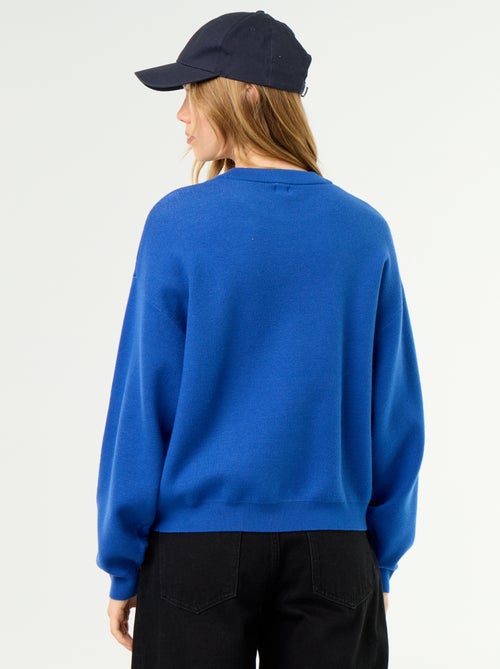 Maglione girocollo in maglia morbida con scritta - Kiabi Maglione girocollo in maglia morbida con scritta - Kiabi