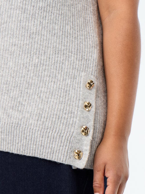 Maglione smanicato con gioielli fantasia dorati - Kiabi