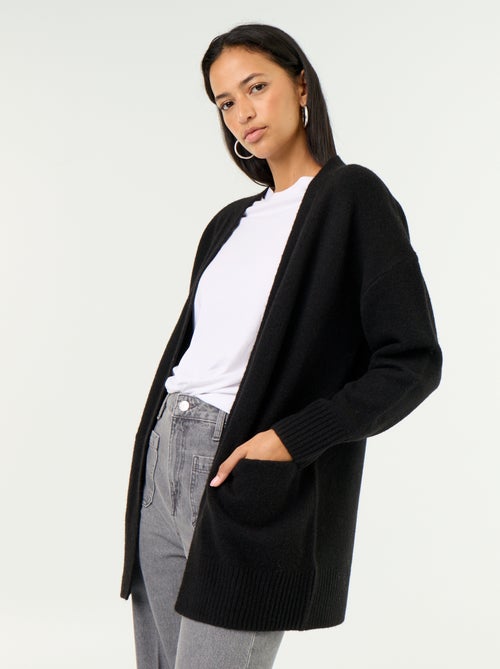 Offene unifarbene Strickjacke mit 2 aufgesetzten Taschen - Kiabi Offene unifarbene Strickjacke mit 2 aufgesetzten Taschen - Kiabi