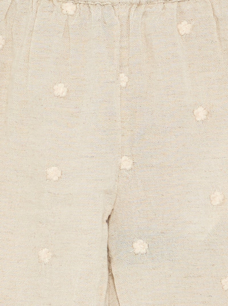 Pantalon avec broderies fleurs Beige - Kiabi