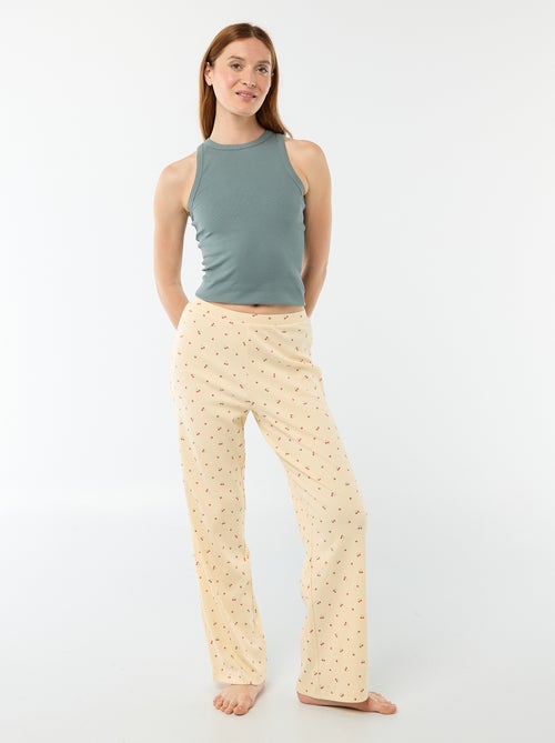 Pantalon côtelé de nuit all-over 'fleur' - Kiabi