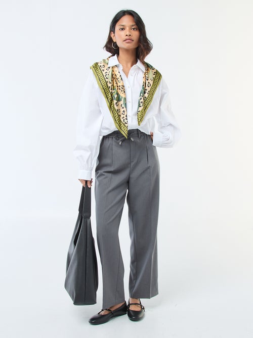 Pantalon coupe large à la taille élastiquée + liens à nouer - Kiabi