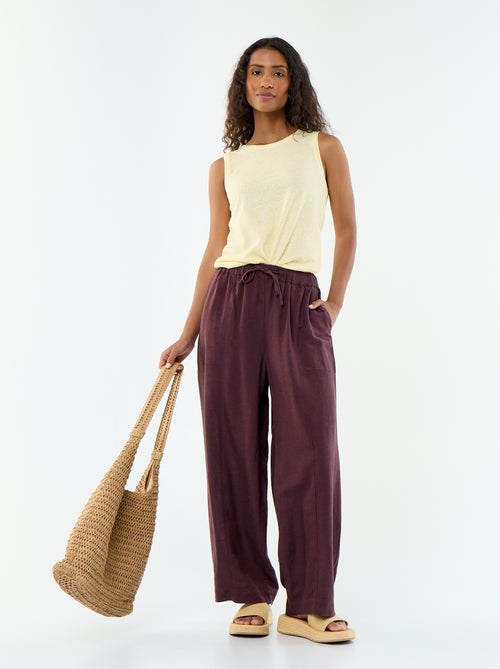 Pantalon femme en tissu léger à coupe large et taille haute - Kiabi Pantalon femme en tissu léger à coupe large et taille haute - Kiabi